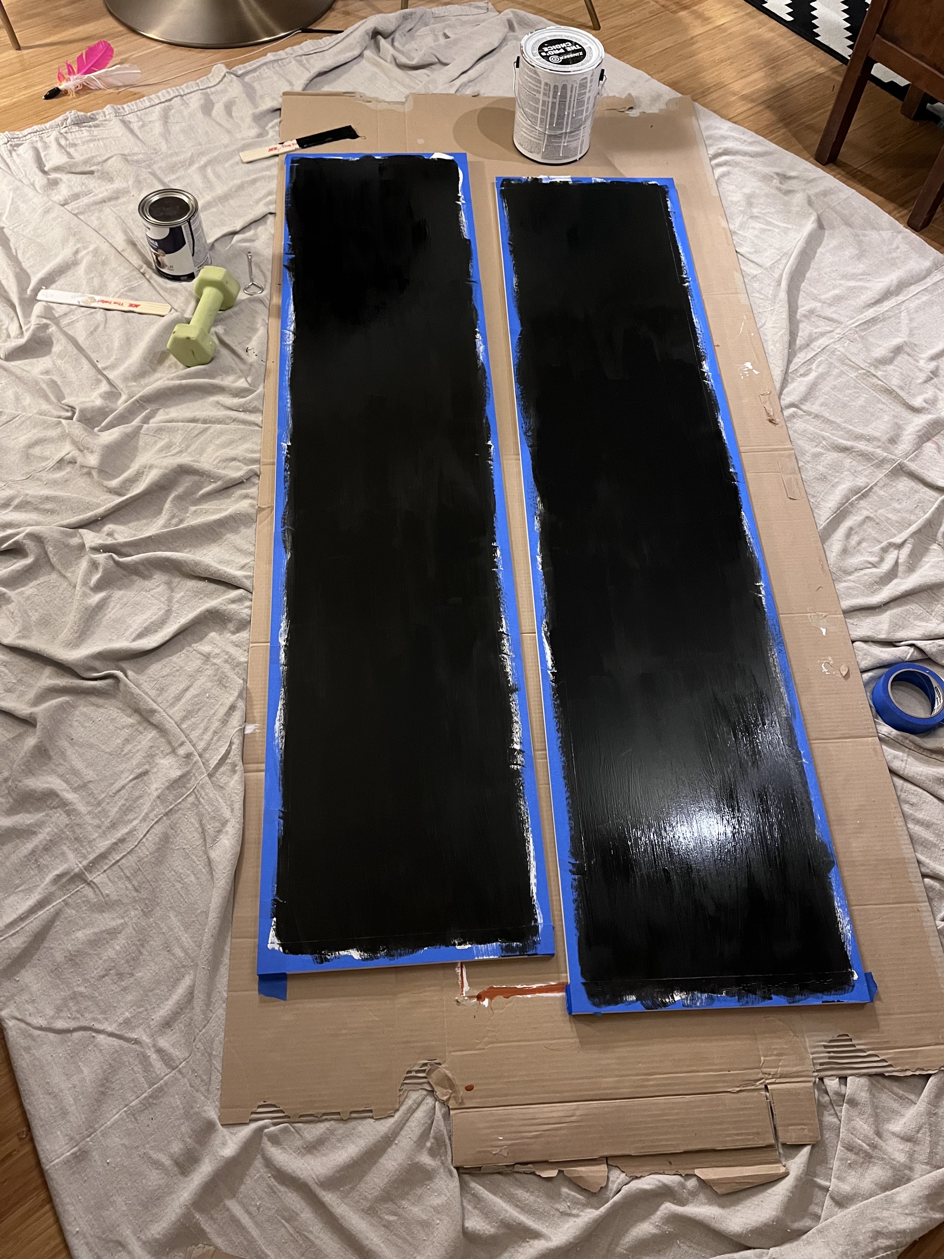 Two closet doors painted black